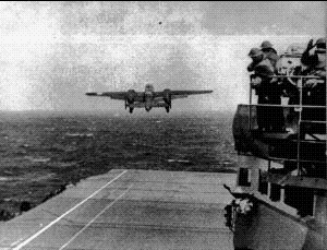 A B-25B bomber launches from the deck of the Hornet.