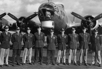 Mclaughlin fourth from left stands with his crewmates, Mclaughlin would lead the mission control plane in the largest air raid in history, the second mission against Schweinfurt.